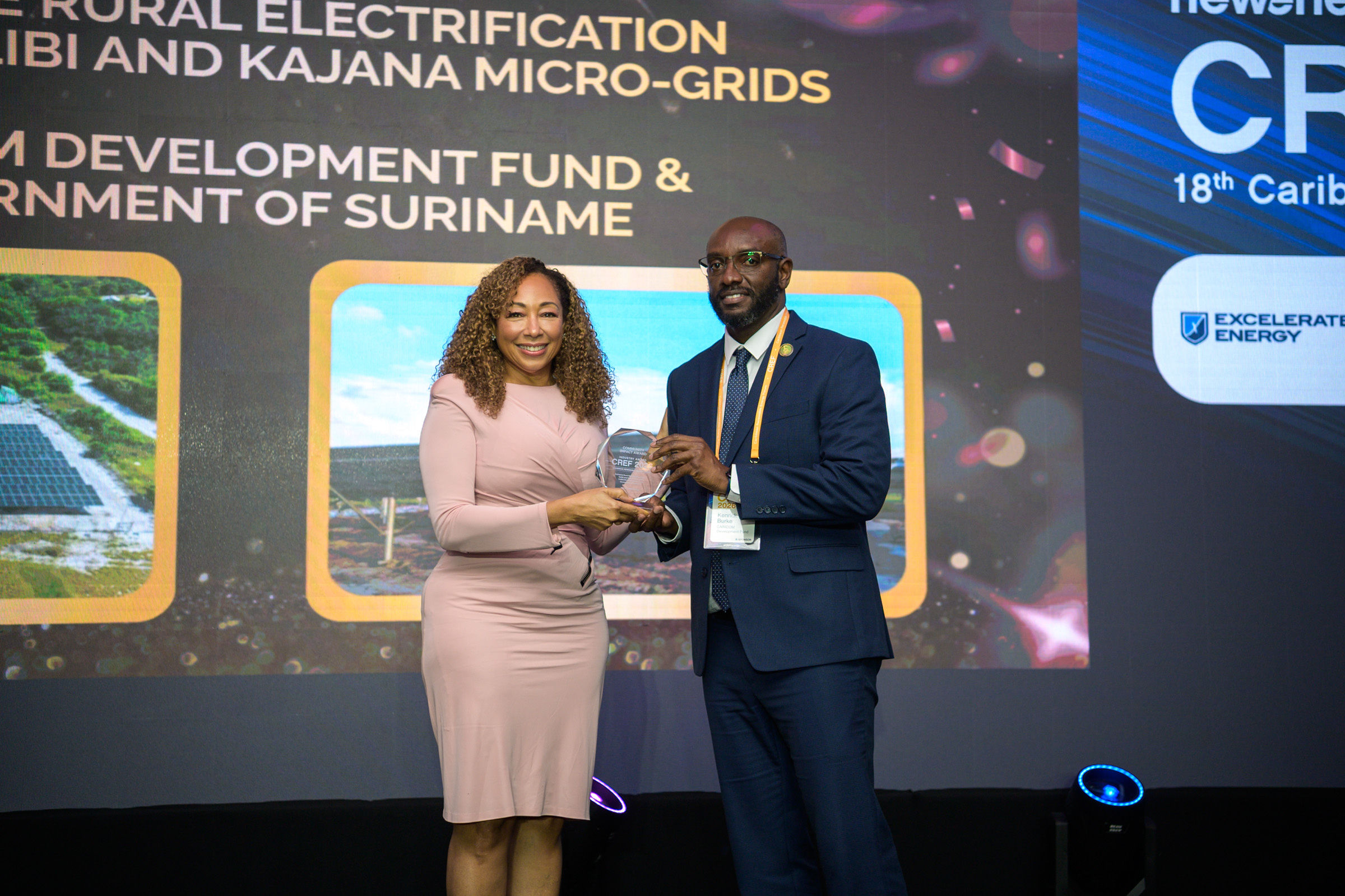 Kenrick Burke accepts the CREF 2026 Community Impact Award on behalf of CDF